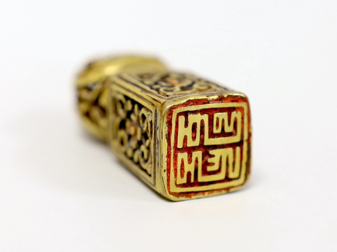 A Tibetan pierced bronze seal, 5.5cm